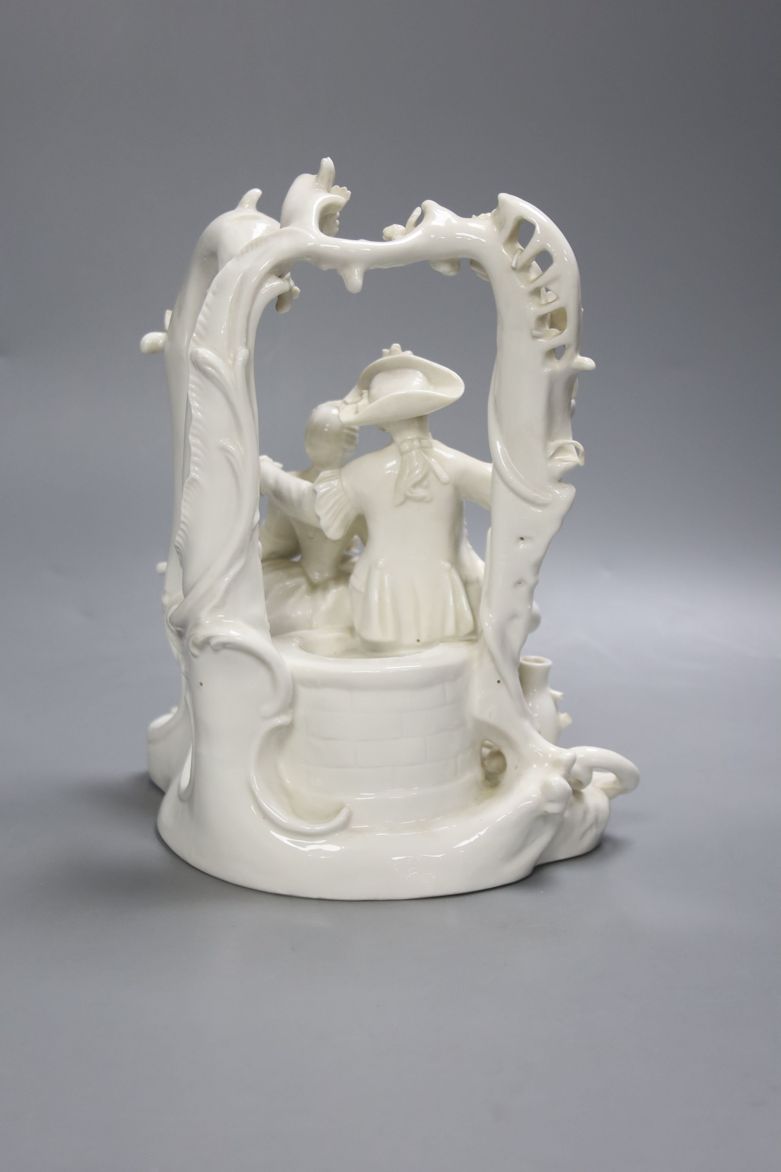 A Nymphenburg white glaze arbour group, 23cm high